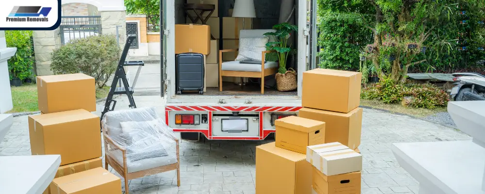 A moving truck loaded with packed boxes